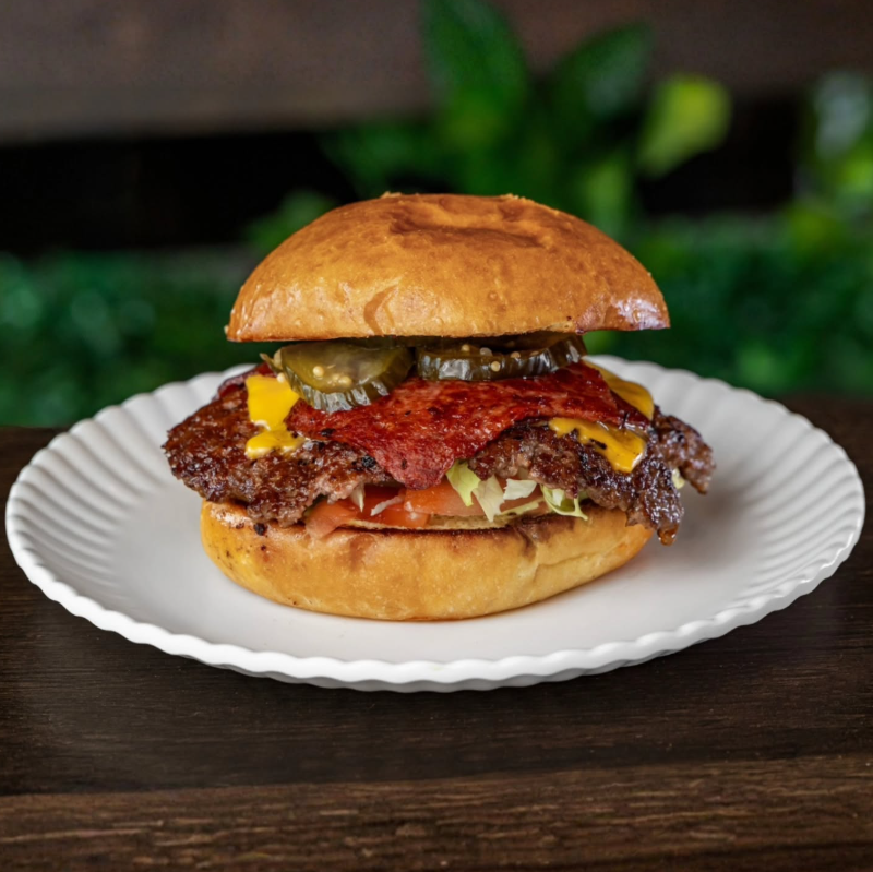 A juicy smash burger with all the fixings from food vendor Ace Shawarma and Burgers